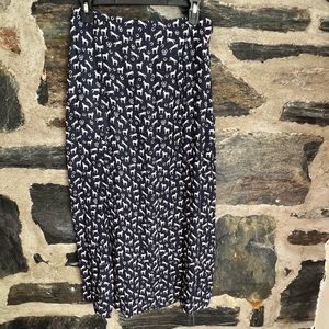 Maje little horses print in ecru on a navy background.